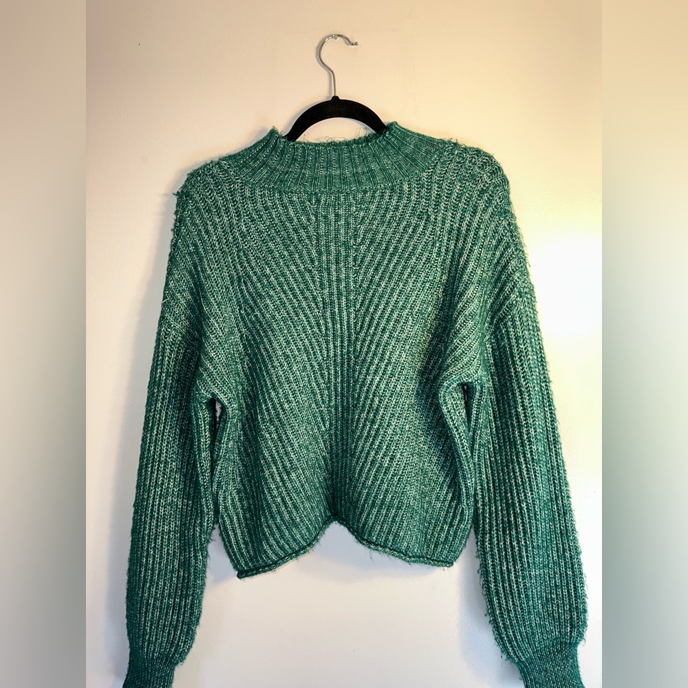 Women’s large green fuzzy sweater.